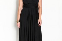 a black draped one shoulder dress with an asymmetrical skirt and black heels is a chic and timeless idea