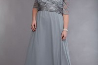 a more formal grey dress with an embellished bodice with short sleeves and a plain flowy skirt plus embellished shoes