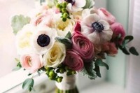 a pretty wedding bouquet of white anemones, pinka nd blush ranunculus and greenery will be a nice idea for a spring or summer wedding