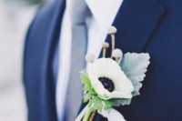 a delicate white anemon and pale miller boutonniere will be a catchy idea for a spring or summer wedding
