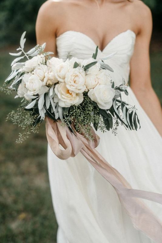 white peonies with eucalyptus and olive greenery plus blush ribbons for a chic and scented wedidng bouquet
