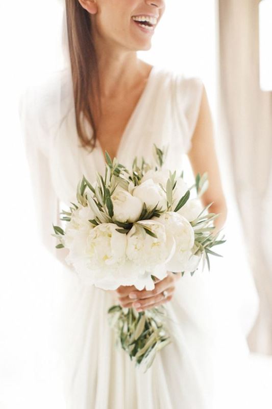 a lush white peony wedding bouquet with greenery is a great idea for a summer bride