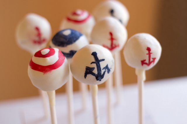 anchor and striped cake pops are perfect for your nautical bridal shower dessert table
