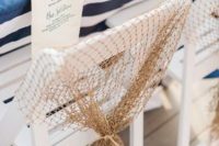 cover the table with a striped tablecloth and your chairs with fishing net for a nautical bridal shower