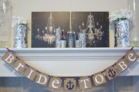 a burlap banner with themed words is a cool and simple decoration for your nautical shower