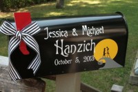 a black mailbox with the names and a little flag for a Nightmare Before Christmas wedding