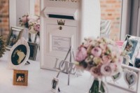 a vintage white wedding mailbox surrounded with your couple’s photos and pastel blooms in jars