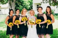 sunflower bouquets are adding a bright spot to your monochromatic wedding attire