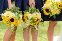 wedding bouquets with sunflowers, white blooms, greenery for a cute rustic touch