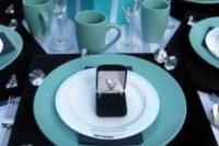a breakfast at Tiffany’s bridal shower setting in blue, black and white, with white roses and diamonds