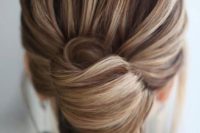 a chic and elegant French twist updo with a voluminous top and an elegant knot will fit medium length hair, too