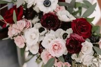 a contrasting wedding bouquet of pink, burgundy and blush roses, white anemones and greenery is a chic idea to rock