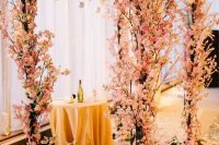 a lush cherry blossom wedding chuppah like this one will instantly bring an outdoor feel even if you are having an indoor wedding