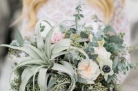 a pretty neutral wedding bouquet with an air plant, neutral and pastel blooms and greenery is a stylish idea for a spring or summer bride