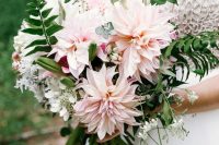a subtle blush wedding bouquet of dahlias, some white fillers and greenery is a gorgeous idea for spring or summer