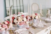 a super refined Parisian-themed bridal shower table with neutral and pink blooms, neutral candles and porcelain, gold touches