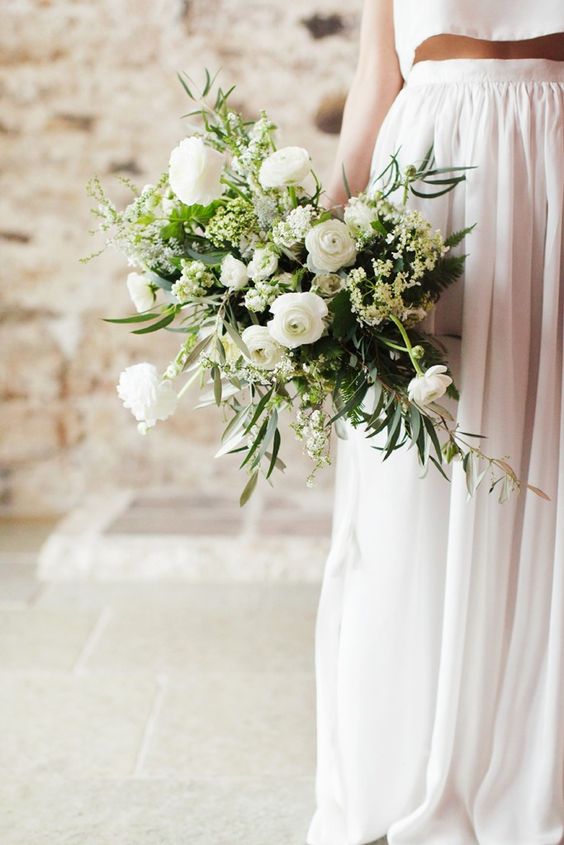 a textural wedding bouquet in white and green with an interesting those who love simplicity and classics