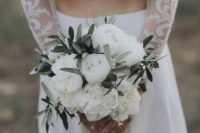 a white peony and olive greenery wedding bouquet is classics with a frehs and modern twist