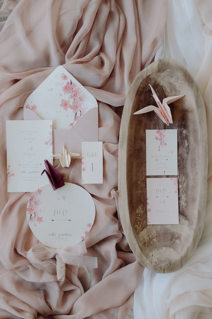 lovely wedding invitation suite with pink cherry blossom prints is right what you need for spring