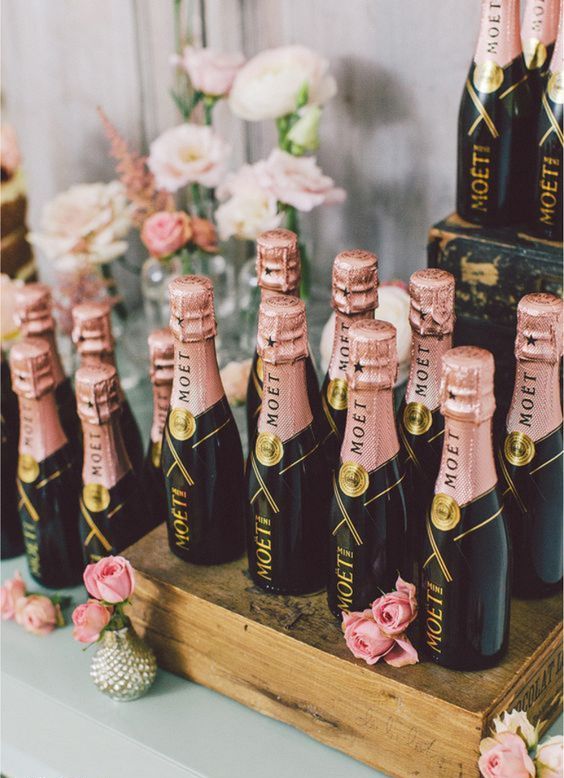 mini Moet champagne bottles are adorable favors for a French inspired bridal shower