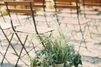 potted greenery and succulents to line up the aisle and make it fresher and bolder