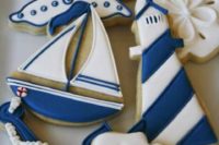 stylish nautical themed cookies with navy and white glazing are amazing for a nautical themed shower