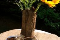 a cowgirl boot with wildflowers and a sunflower is a nice and simple themed bridal  shower centerpiece