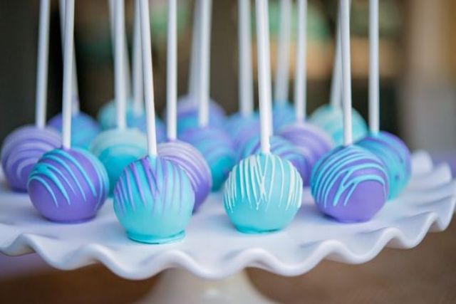 bold purple and mint candy pops are great for a mermaid bridal shower or wedding