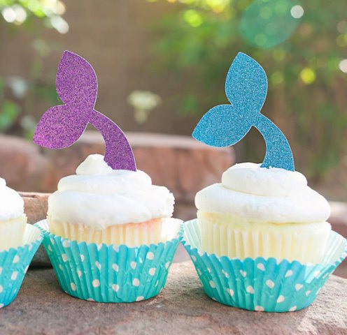 cupcakes with frosting and glitter mermaid tail toppers are amazing for your mermaid bridal shower
