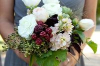 Bridesmaid bouquet with unripe blackberries