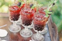 Wedding drinks with ripe blackberries