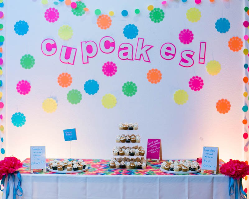 The dessert table background was decorated with colorful paper doilies