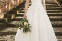 12 A-line wedding dress with cap sleeves