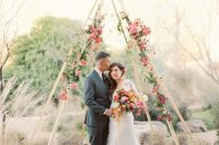 13 teepee-styled desert wedding arch