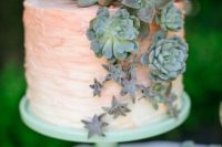 15 blush wedding cake decorated with succulents