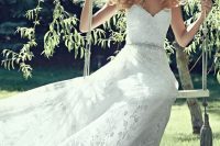 20 lace wedding gown with a corset and an embellished belt