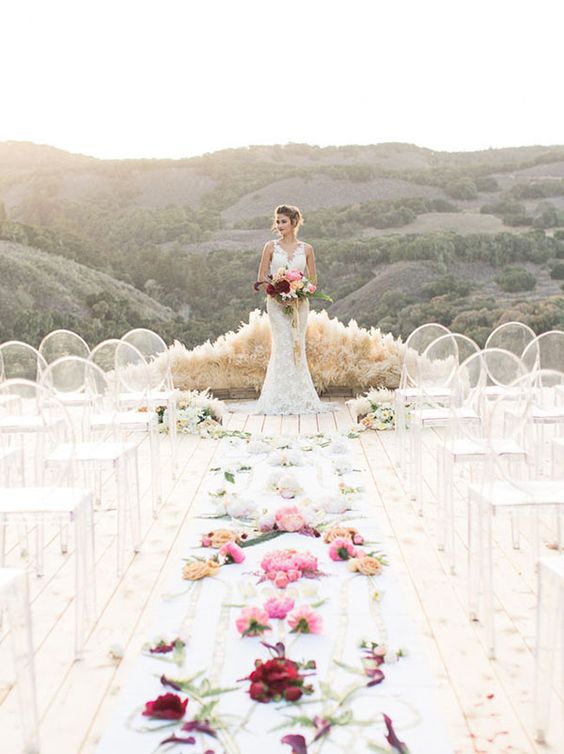 wedding aisle decorated with fresh flowers