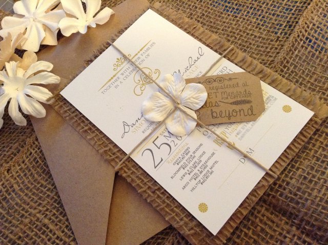 Charming wedding invitation with burlap and flowers