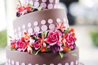 Colorful topsy turvy wedding cake