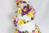 Four tiered topsy turvy wedding cake