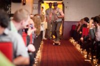 Groom with skateboard on the wedding ceremony