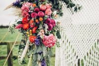 Macrame knotted wedding backdrop for boho chic wedding