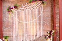 Macrame knotted wedding backdrop for indoor weddings