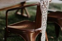 Macrame knotted wedding decor for chairs