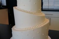 Simple and elegant topsy turvy wedding cake
