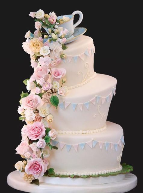 Topsy turvy wedding cake with elegant decor