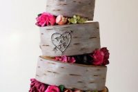 Topsy turvy wedding cake with flowers