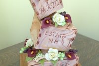 Topsy turvy wedding cake with square tiers