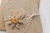 Wedding invitation with flower and burlap heart