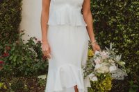 a beautiful ruffle midi dress with a slit, ruffle cap sleeves, a sweetheart neckline, strappy shoes and a pearl necklace